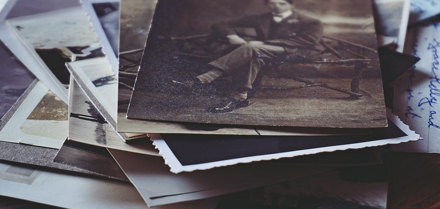 a pile of a collection of old photographs